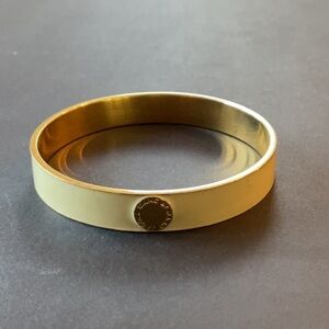 Marc by Marc Jacobs cream enamel bangle bracelet w/logo